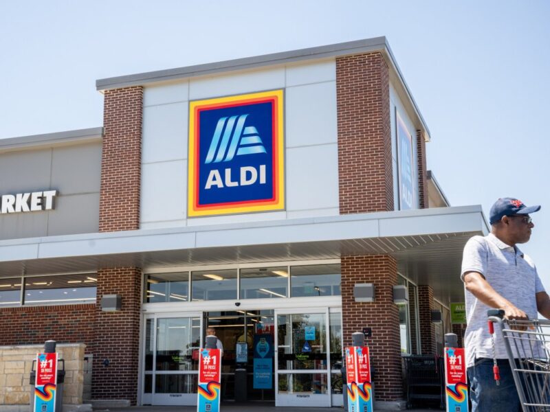 a man standing in front of a store