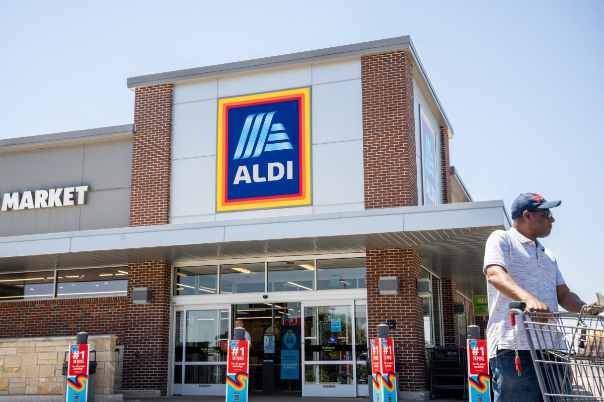 a man standing in front of a store